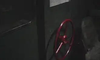 Привод резервного ручного стояночного тормоза тепловоза 2ТЭ10М в кабине локомотива