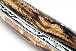 Резьба по обуху клинка