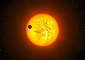 Художественное изображение, показывающее транзит экзопланеты Corot-9b.