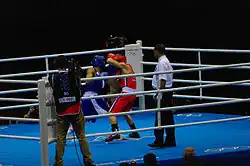 Монх-Эрдэнэ (в синем) на Олимпиаде-2012