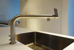 Дизайнерский смеситель с изливом необычной конструкции