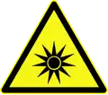 Warning for optical radiation, symbol D-W009 according to German standard DIN 4844-2