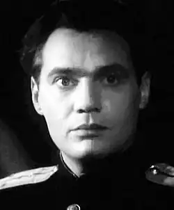 В роли Максимова в фильме «За тех, кто в море» (1947)