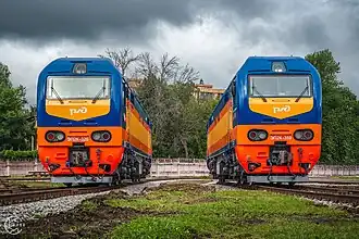 ЭП2К-320 и 359 в сине-оранжево-жёлтой окраске «Мегаполиса»