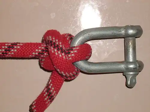 Морской лисель-галсовый узел, завязанный альпинистской верёвкой на скобе