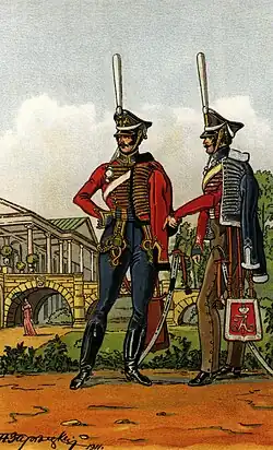 Рядовой Лейб-гвардии Гусарского полка (парадная форма; слева) и рядовой Изюмского гусарского полка (походная форма).