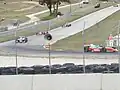 Машины серии Champ Car в гонке исторических автомобилей Kohler International Challenge
