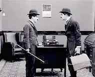 в фильме «Контролёр универмага» (справа)