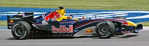 Кристиан Клин, во время практики накануне Гран-при США в 2005 году (команда Red Bull Racing)