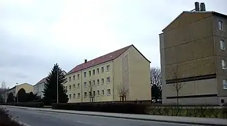 Liebenwerdaer Chaussee mit den dort typischen Wohnblocks