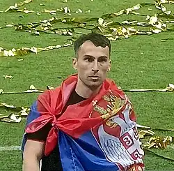 Милан Гайич с флагом Сербии после победы ЦСКА в суперфинале Кубка России по футболу 2025