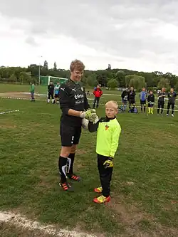 Вромбель во время игры за «Шлёнск», 2012 (слева)