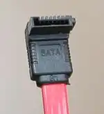 A 7-pin Serial ATA data cable.