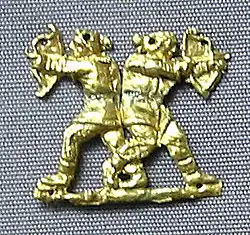Заколка для одежды из золота с изображением скифских лучников