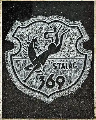 Знак Шталага 369. Памятник военнопленным Шталага 369, Краков, Польша