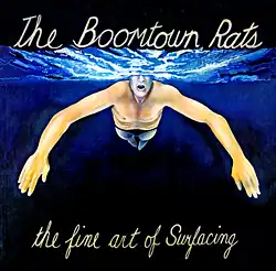Обложка альбома The Boomtown Rats «The Fine Arts of Surfacing» (1979)