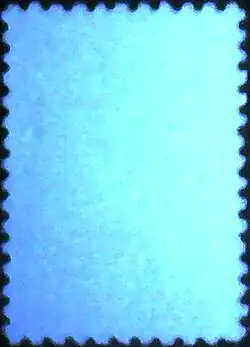 При УФ-излучении с длиной волны 254 нм. Оборот марки