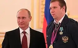 Президент РФ В.В.Путин и Н.А.Прохоров на награждении паралимпийцев в Кремле (2012).