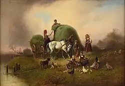 Семья крестьян заготовляет сено