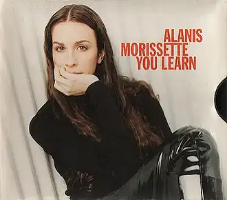 Обложка сингла Аланис Мориссетт «You Learn» (1996)